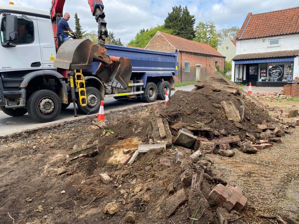 This is a photo of a dig out being carried out for the installation of a new tarmac driveway. Works being carried out by Wymondham Driveway Contractors