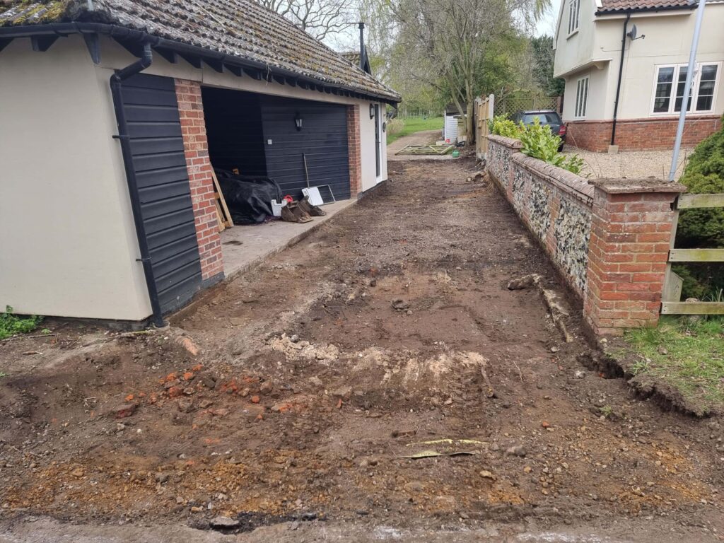 This is a tarmac driveway that is in the process of being dug out and installed by Wymondham Driveway Contractors